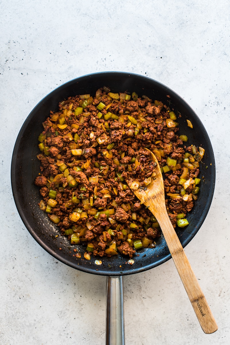 Ingredients for cornbread stuffing in a skillet