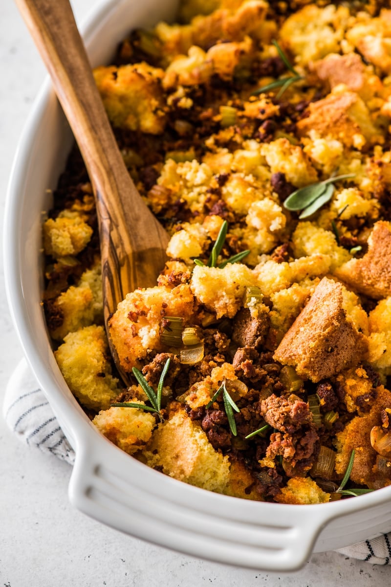 Chorizo cornbread stuffing topped with fresh herbs.