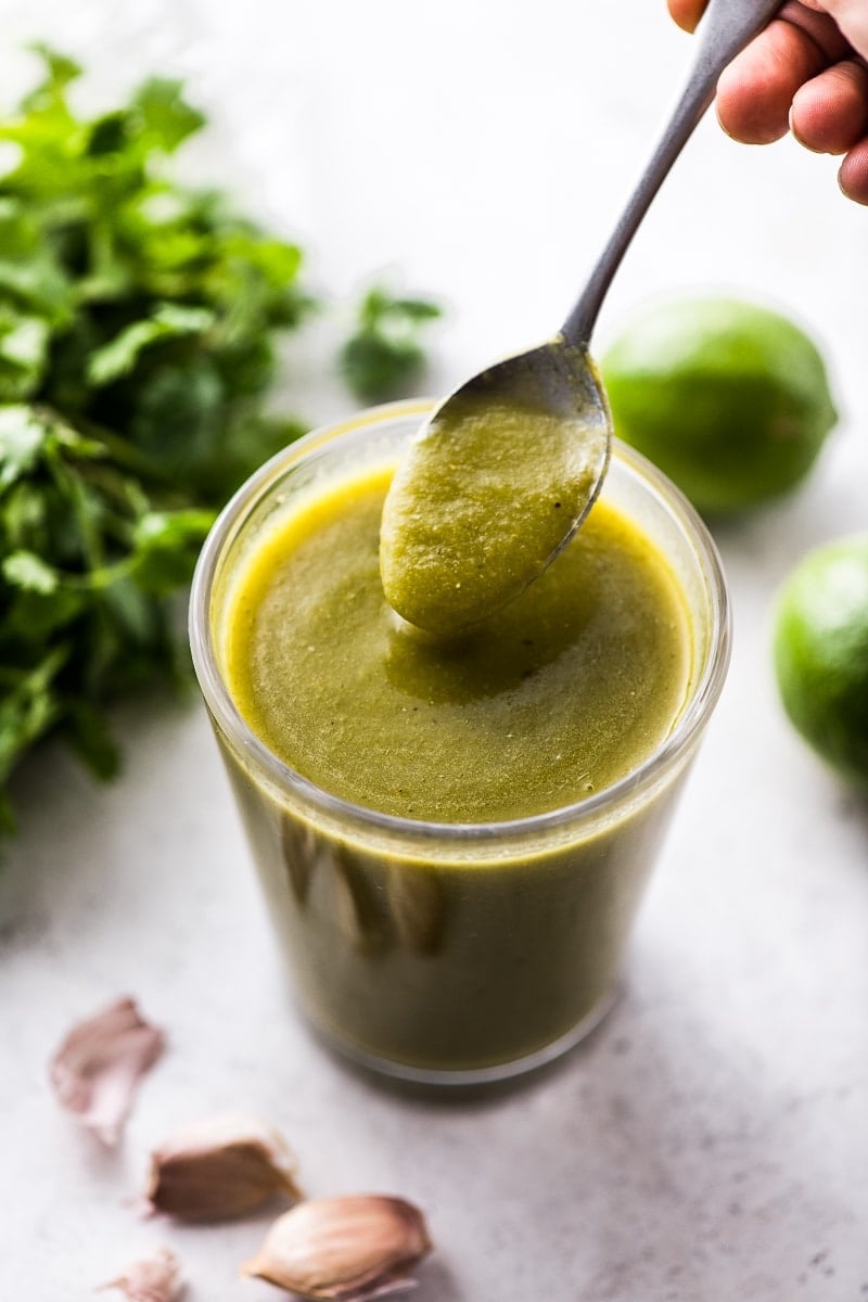 This Green Enchilada Sauce recipe is made from roasted green chiles, onions, garlic, and some classic Mexican herbs and spices all in only 20 minutes!