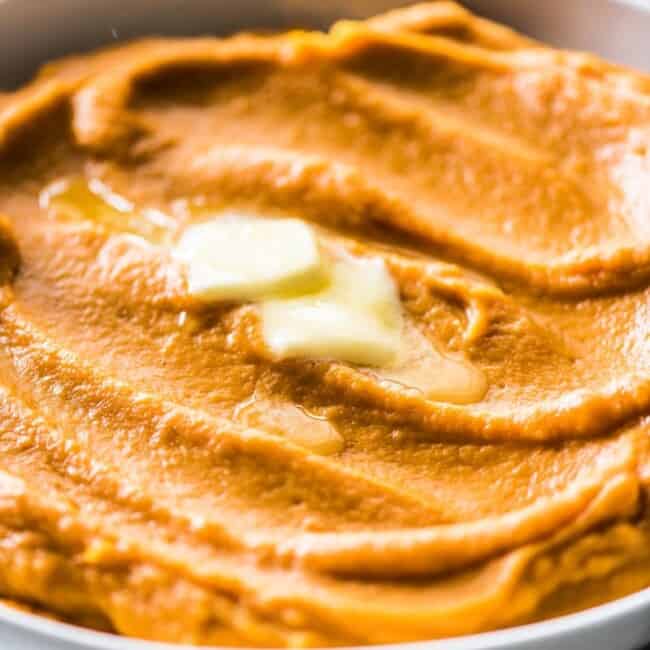 These Mashed Sweet Potatoes are easy to make, creamy and seasoned with cinnamon and a touch of maple syrup. The perfect healthy side dish for the holidays that's also paleo, gluten free, vegetarian and vegan. #sweetpotatoes #sidedish #holidays