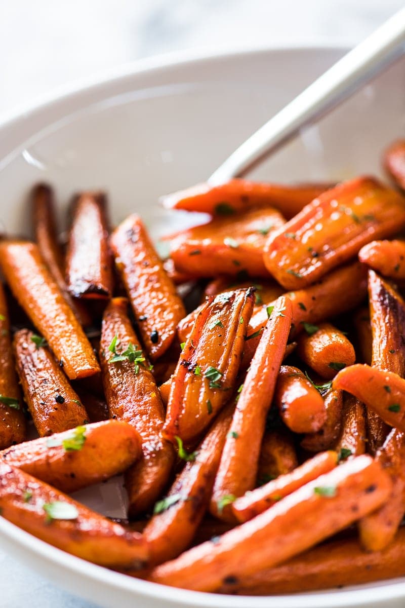 Oven roasted carrots topped with chopped parsley