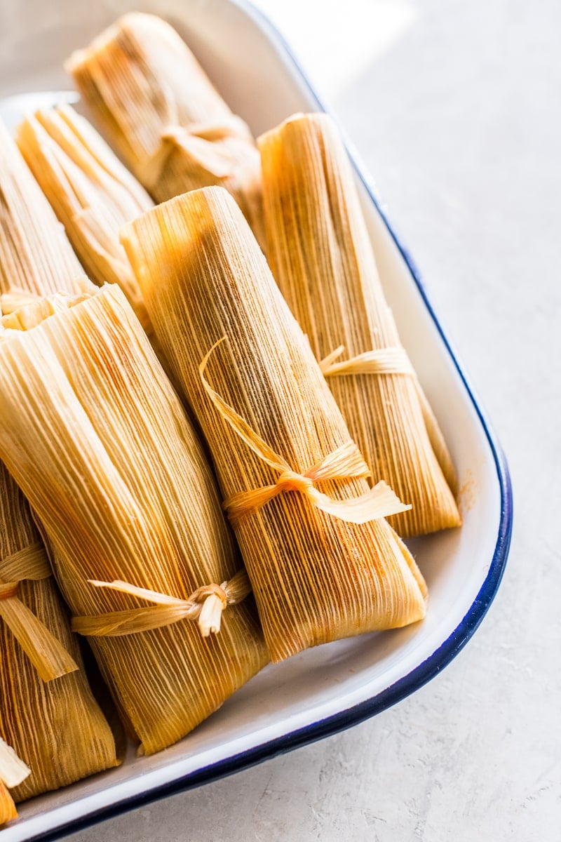 Mexican tamales recipe on a serving tray ready to eat.