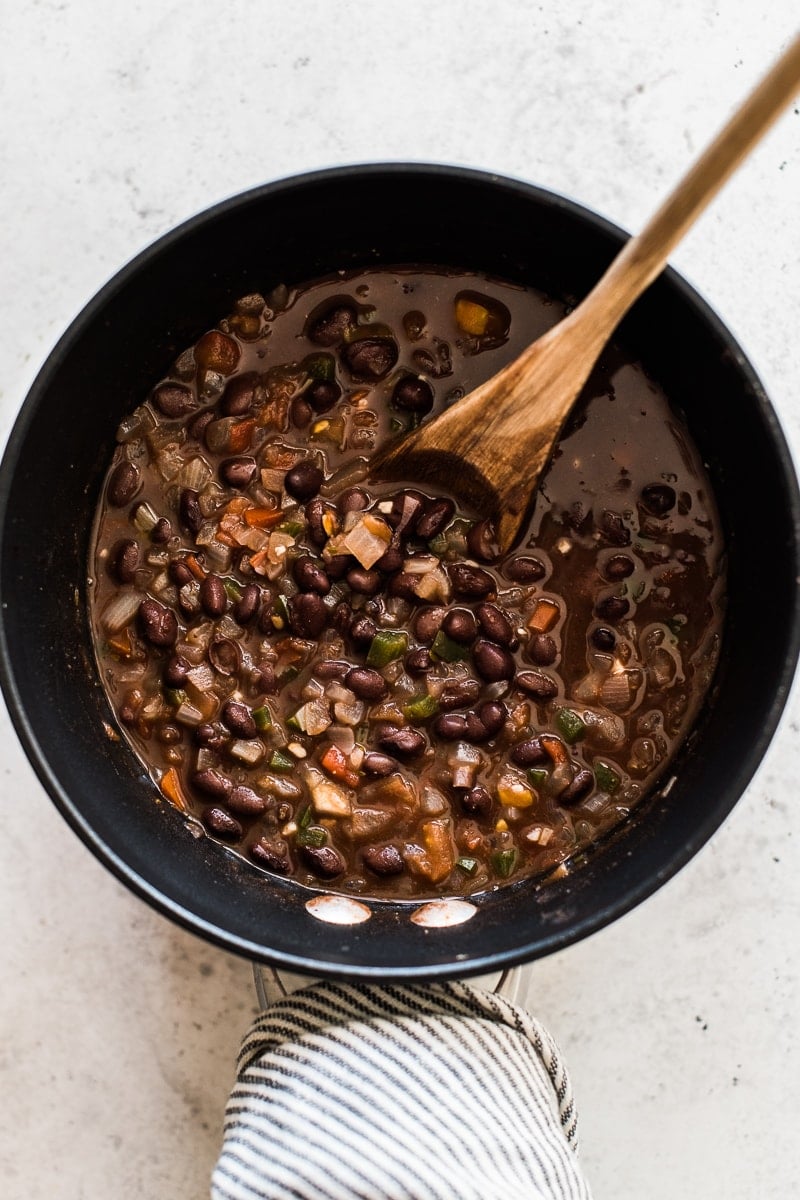 How to cook canned black beans in a pot on the stove