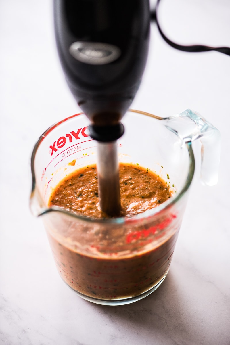 Ranchero sauce being blended until smooth