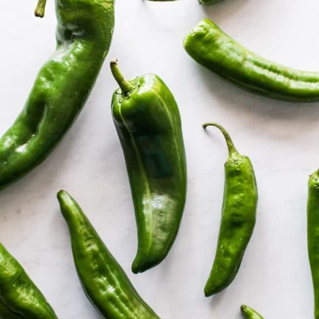 Anaheim peppers on a table