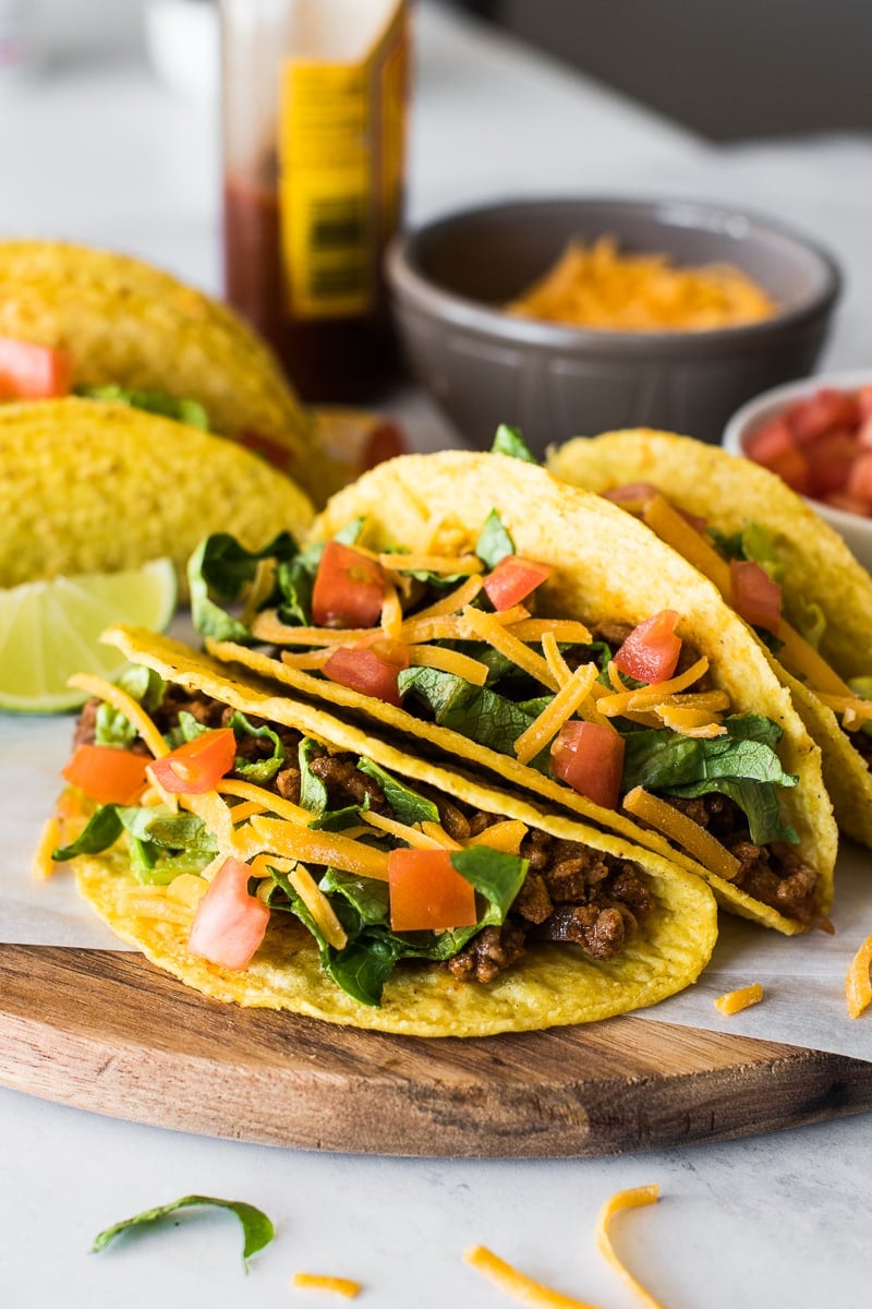 Hard shell tacos filled with ground beef and cheese.