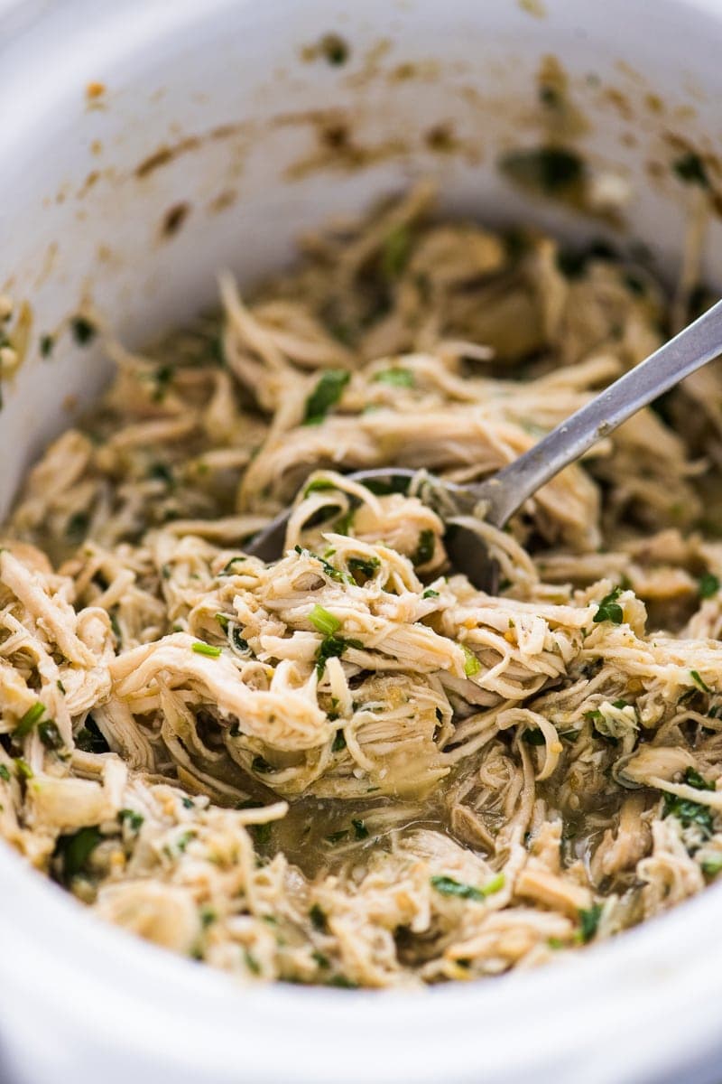 Salsa verde chicken topped with cilantro and shredded