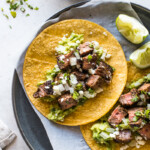 Carne asada tacos on a plate