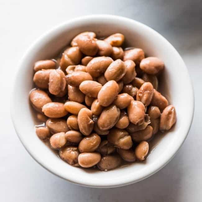 A small bowl of cooked pinto beans