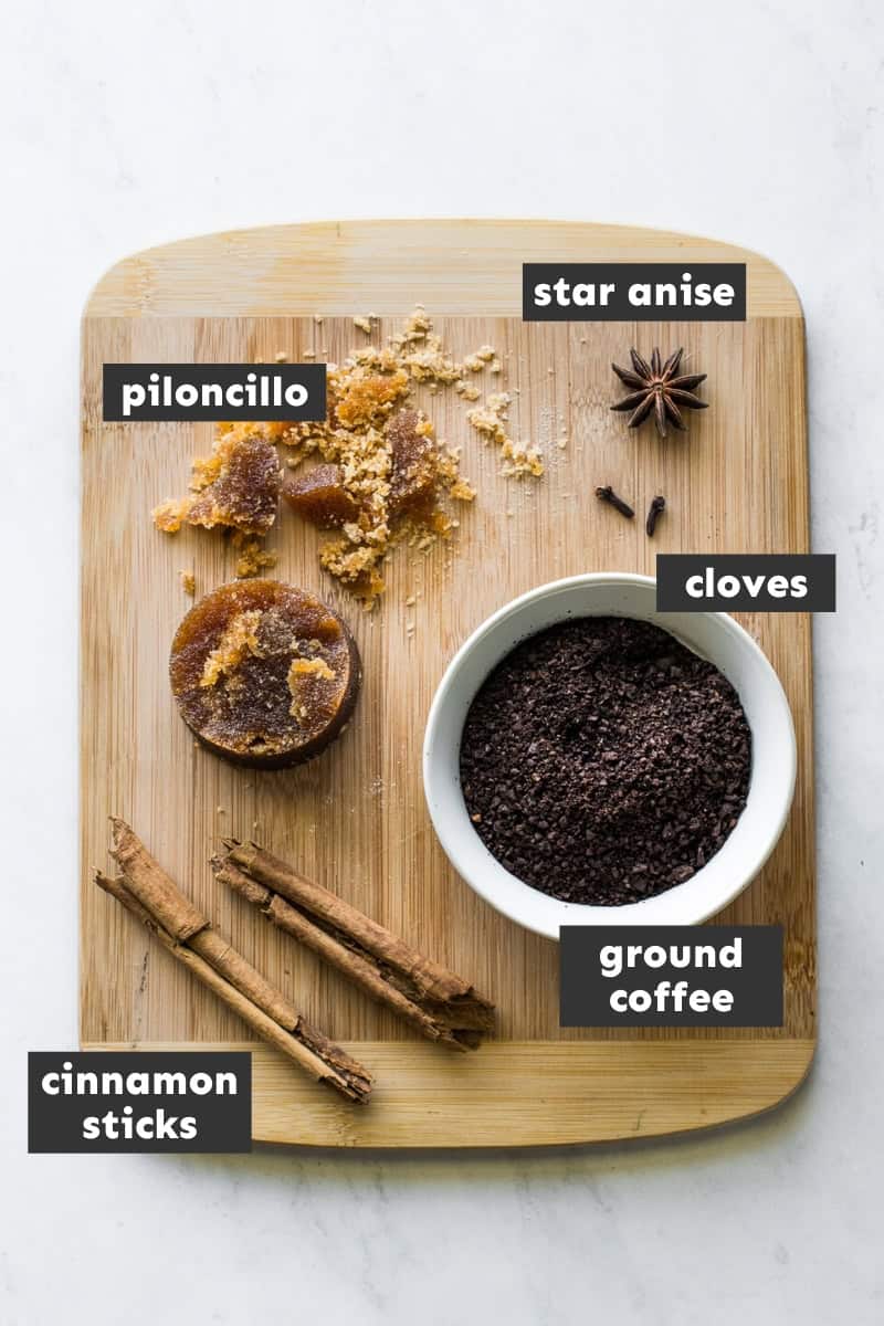 Cafe de olla ingredients on a cutting board.