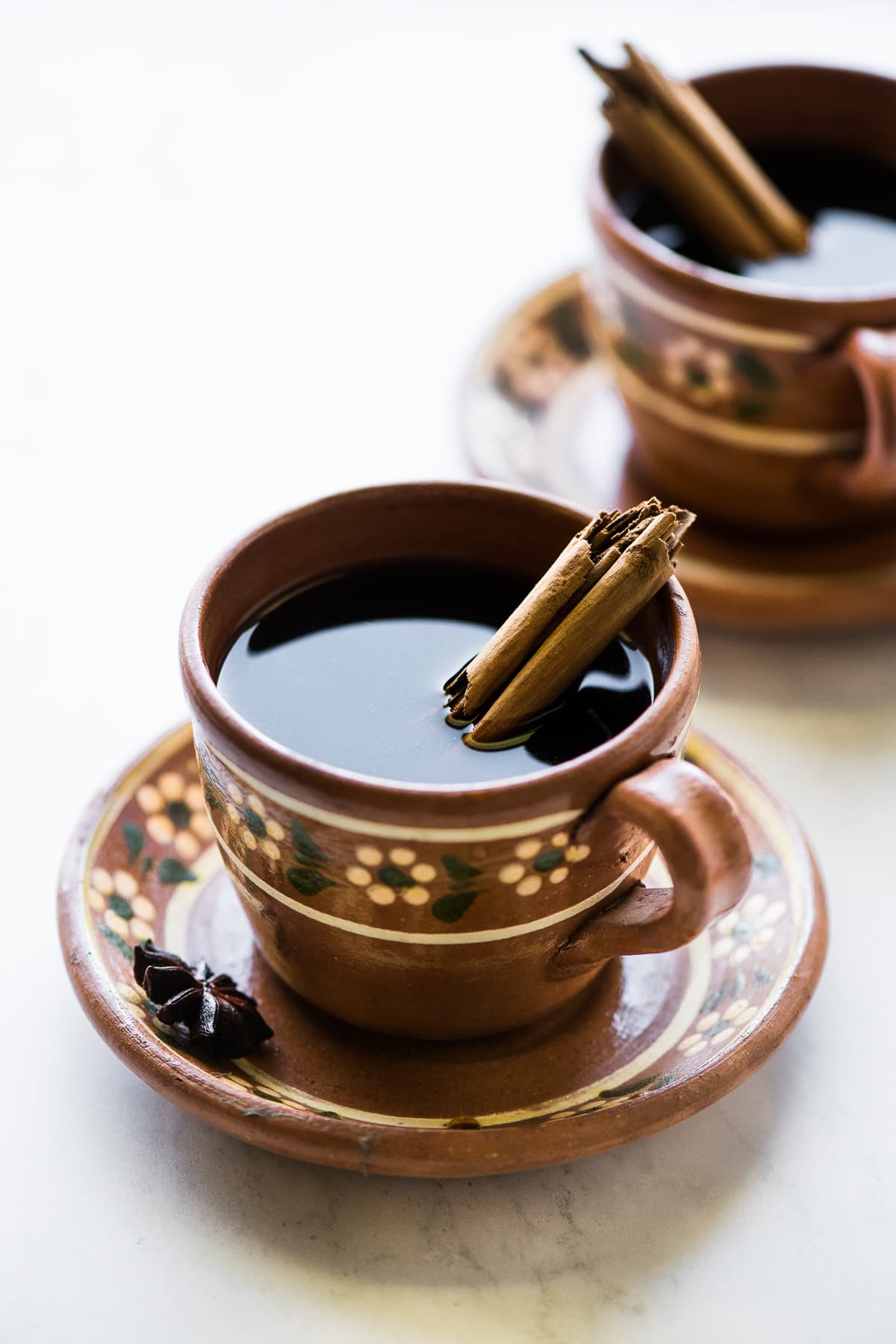 A mug full of cafe de olla or Mexican coffee