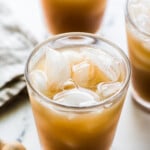 Agua de Tamarindo drink in a glass with ice.