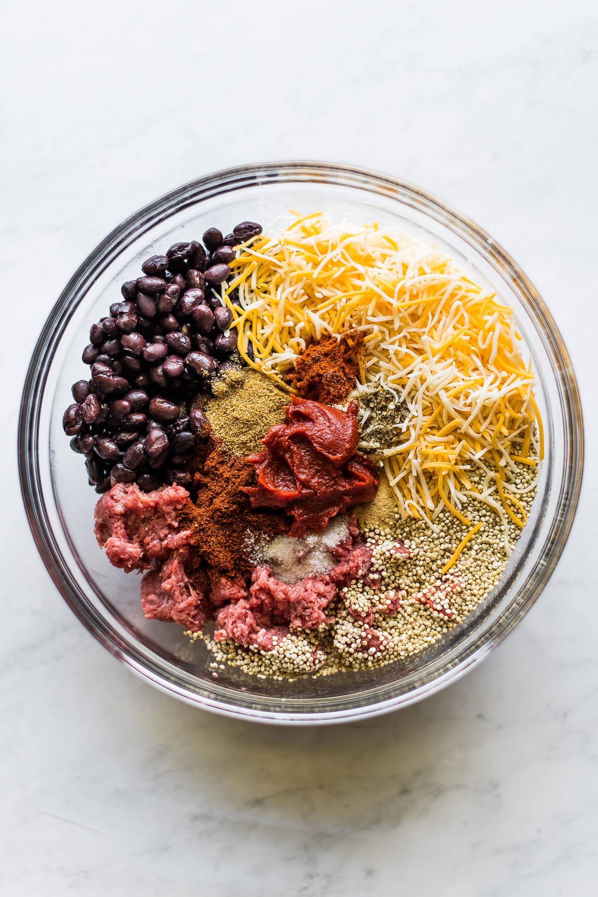 Ingredients for crockpot stuffed peppers in a bowl.