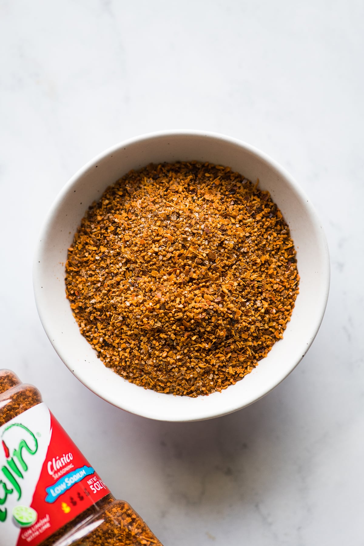 Tajin seasoning in a small bowl.