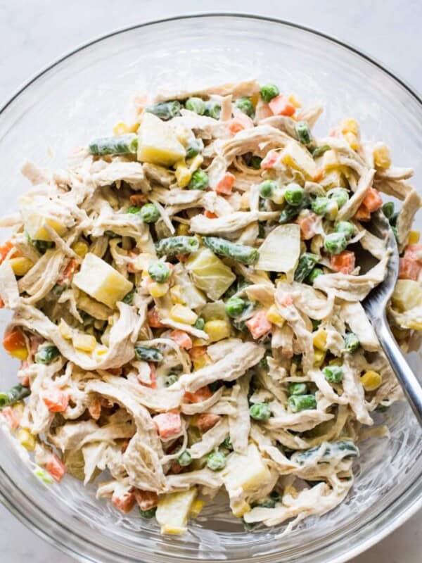 Ensalada de pollo in a mixing bowl.