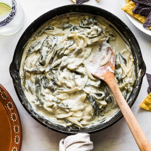 Rajas con crema in a skillet ready to be eaten.