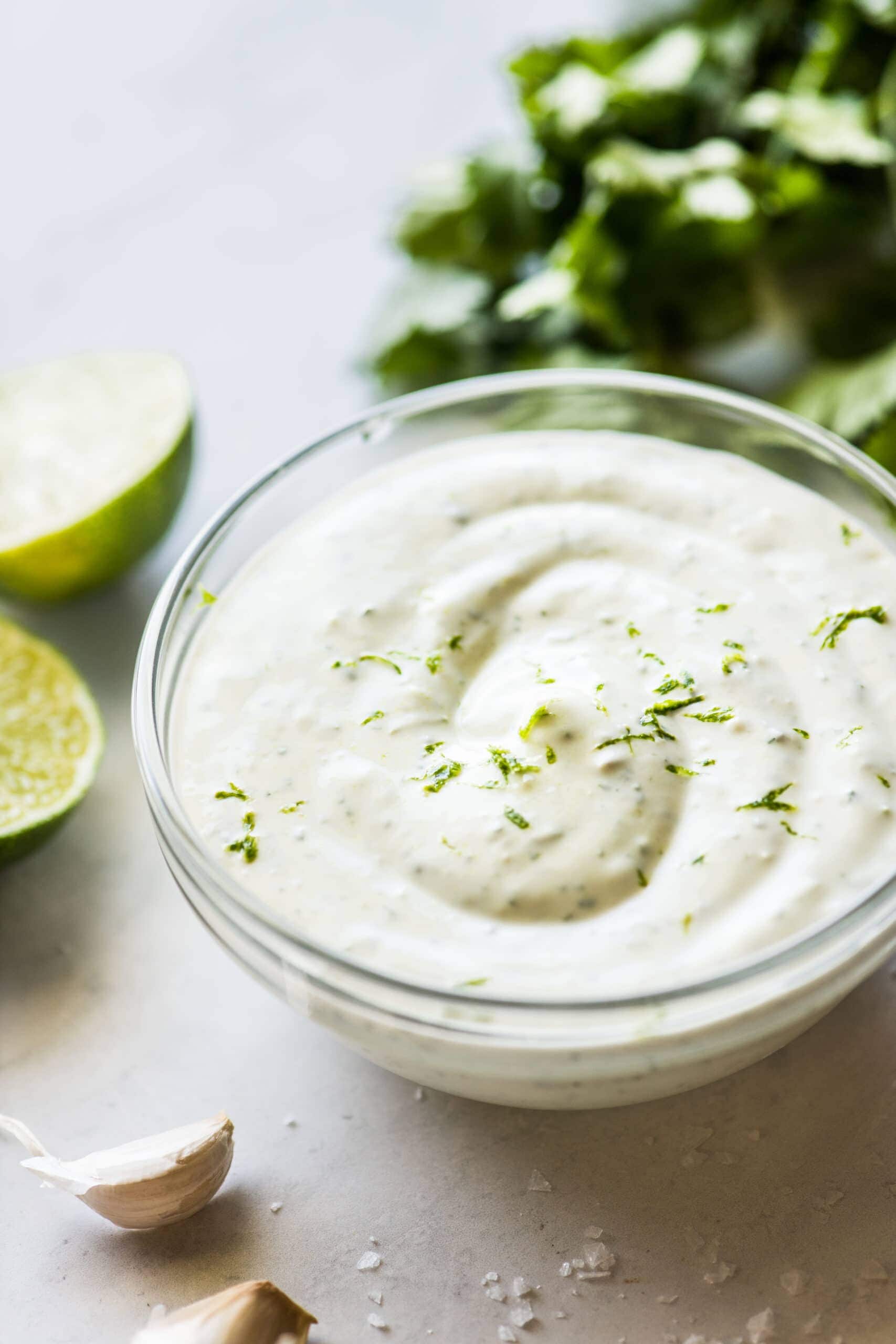 Cilantro lime crema in a bowl.