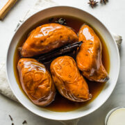 Camote enmielado in a large bowl with piloncillo syrup.