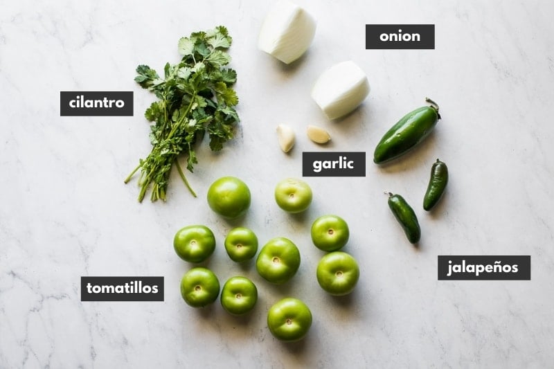 Ingredients for salsa verde on a table.