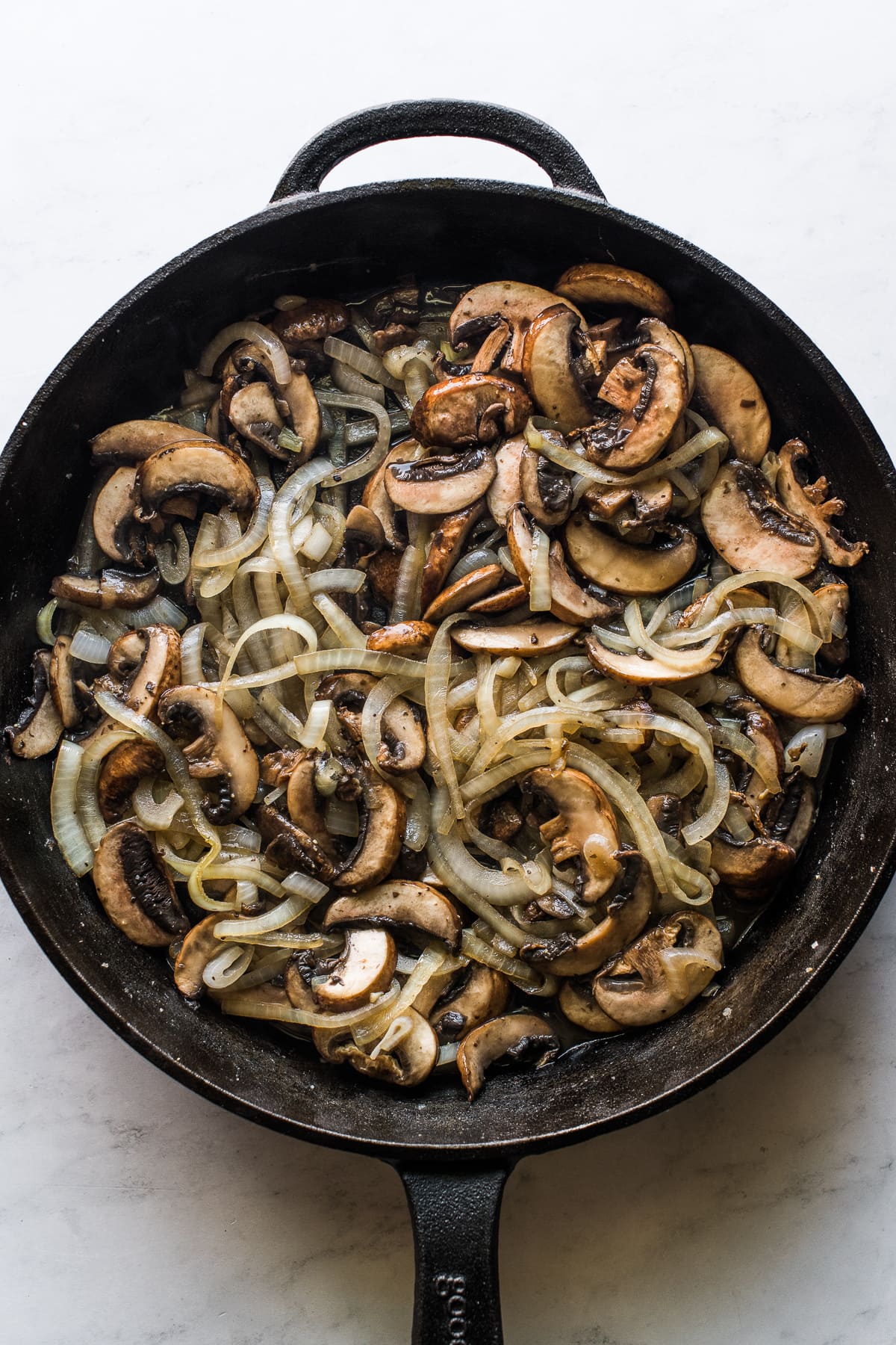 Sauteed onions and mushrooms for green bean casserole.