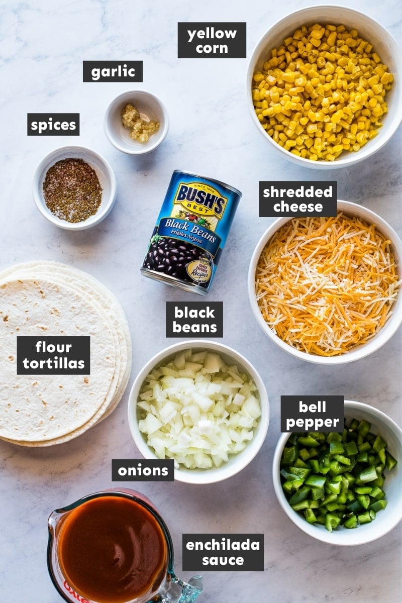 Ingredients in black bean enchiladas on a table.