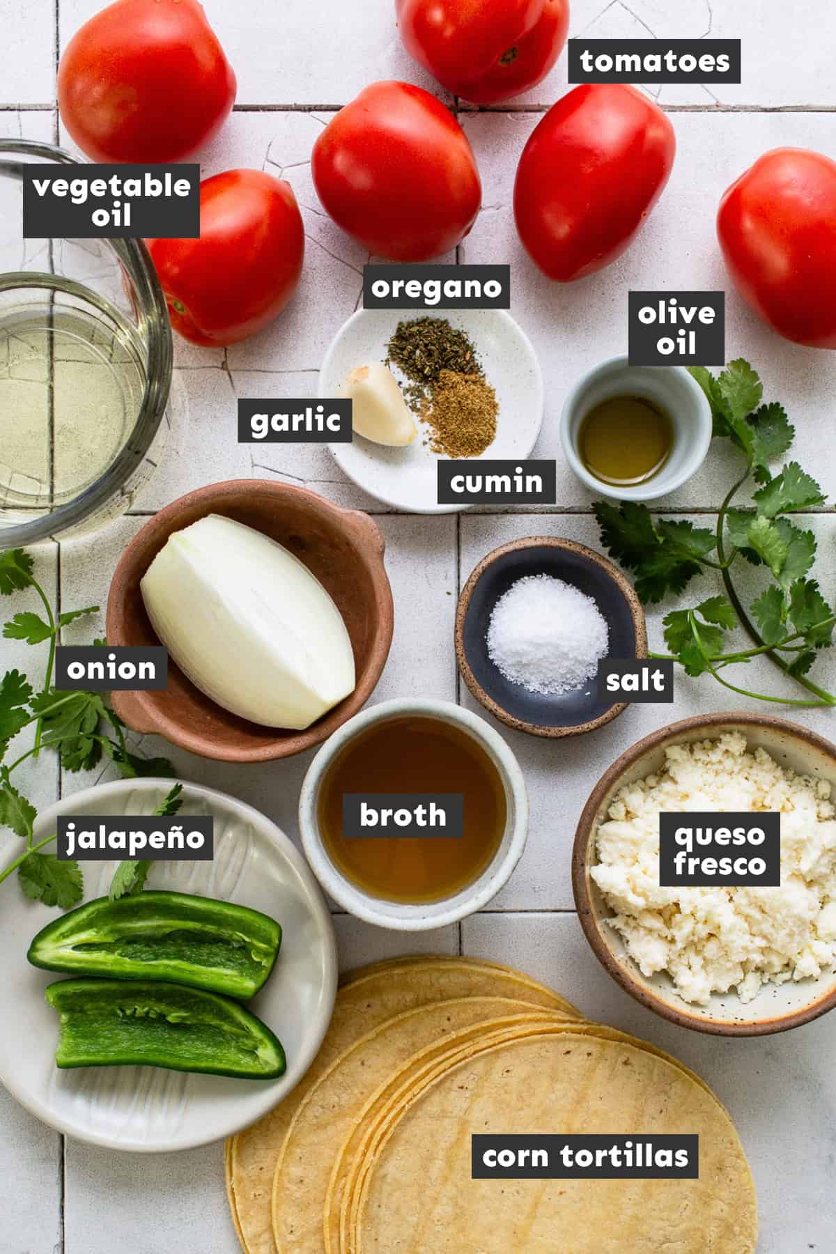 Ingredients for entomatadas on a table.
