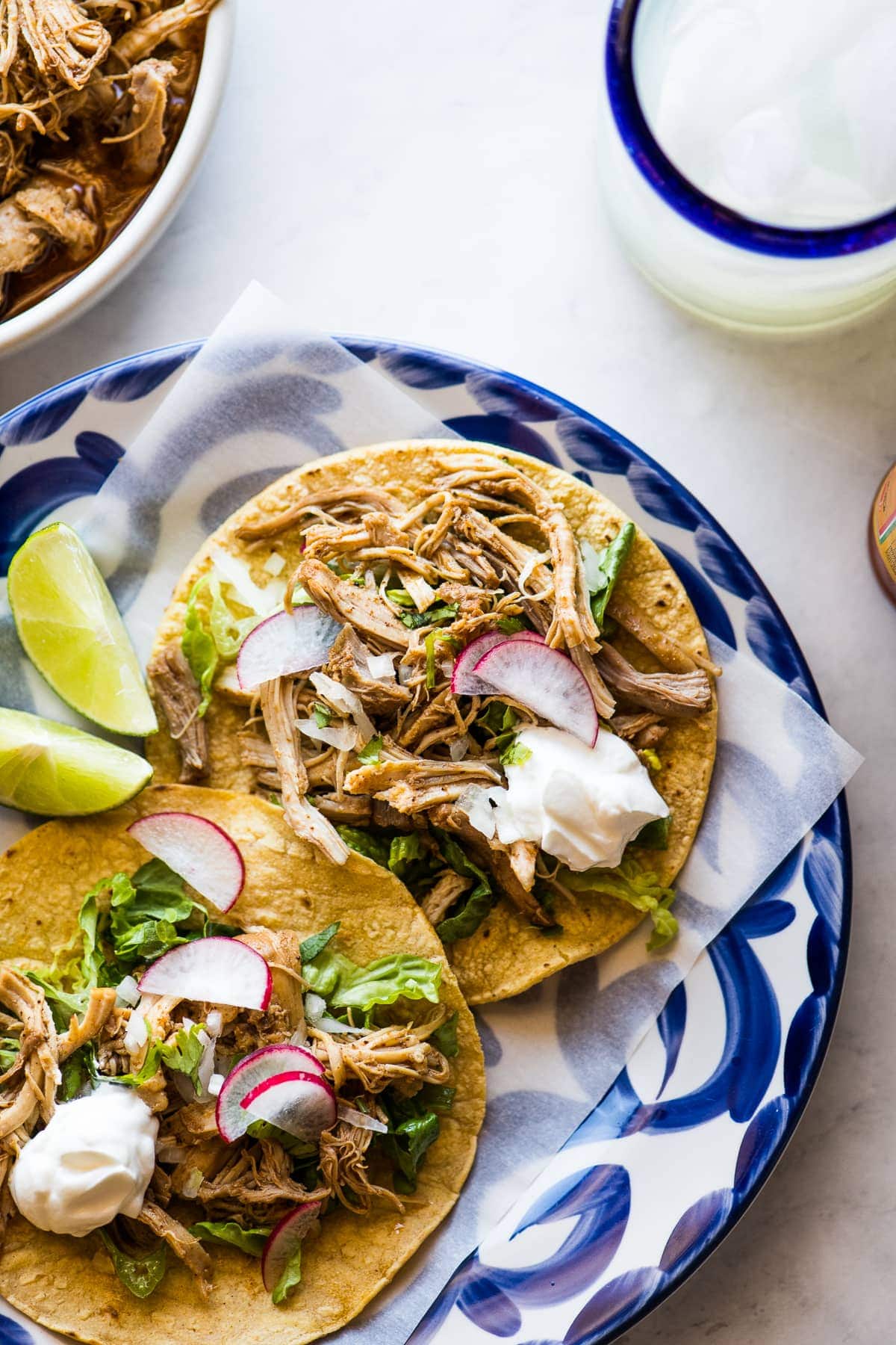 Instant Pot Chicken Tacos on a plate ready to be served.