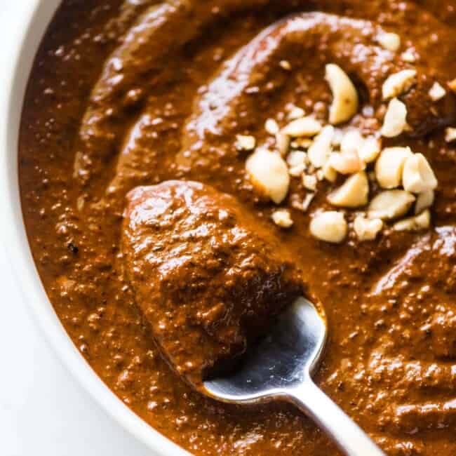 Salsa Macha in a bowl with a spoon in it.