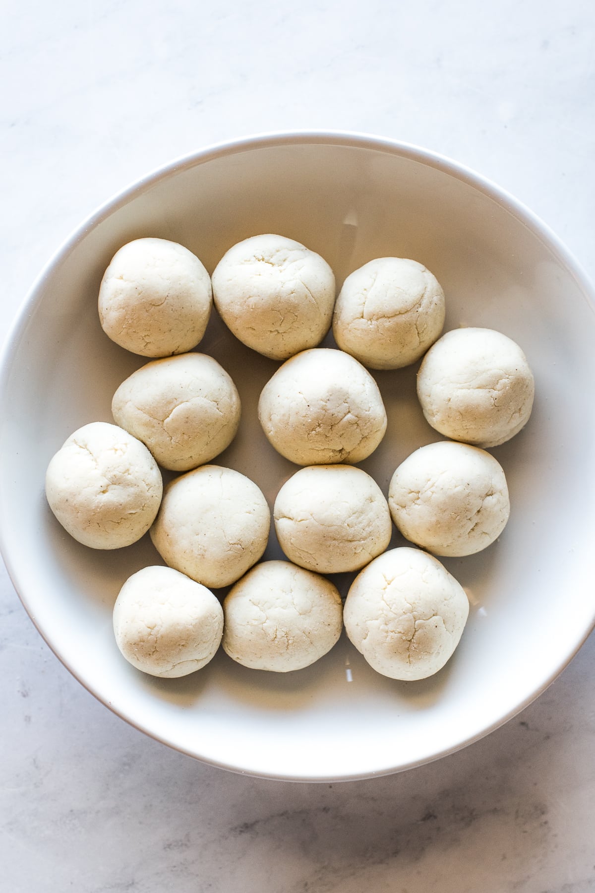 Masa harina for sopes rolled into balls.