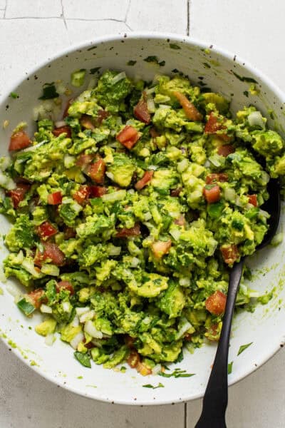Guacamole in a serving bowl ready to eat.