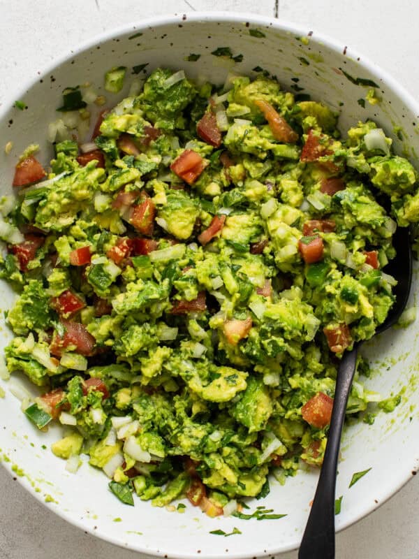 Guacamole in a serving bowl ready to eat.
