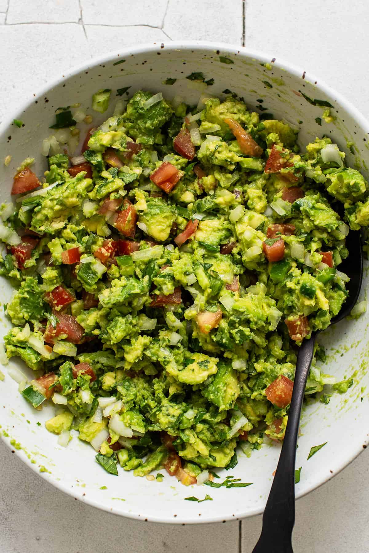 Guacamole in a serving bowl ready to eat.