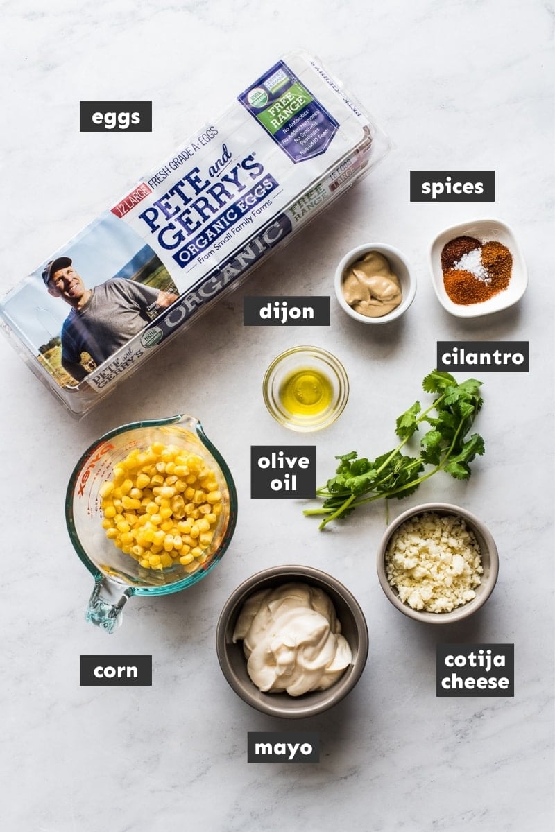 Ingredients for Mexican Street Corn Deviled Eggs on a table.