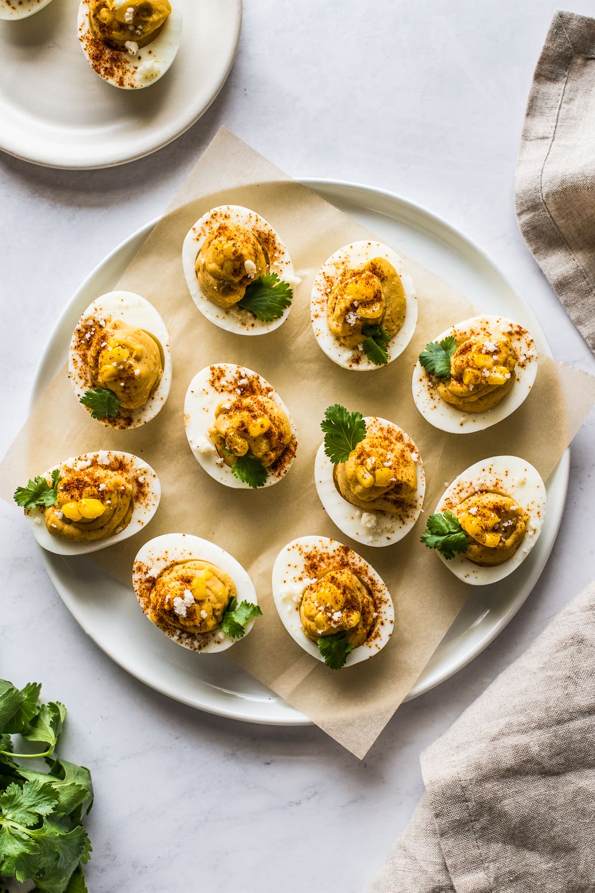 A serving platter filled with Mexican street corn deviled eggs.