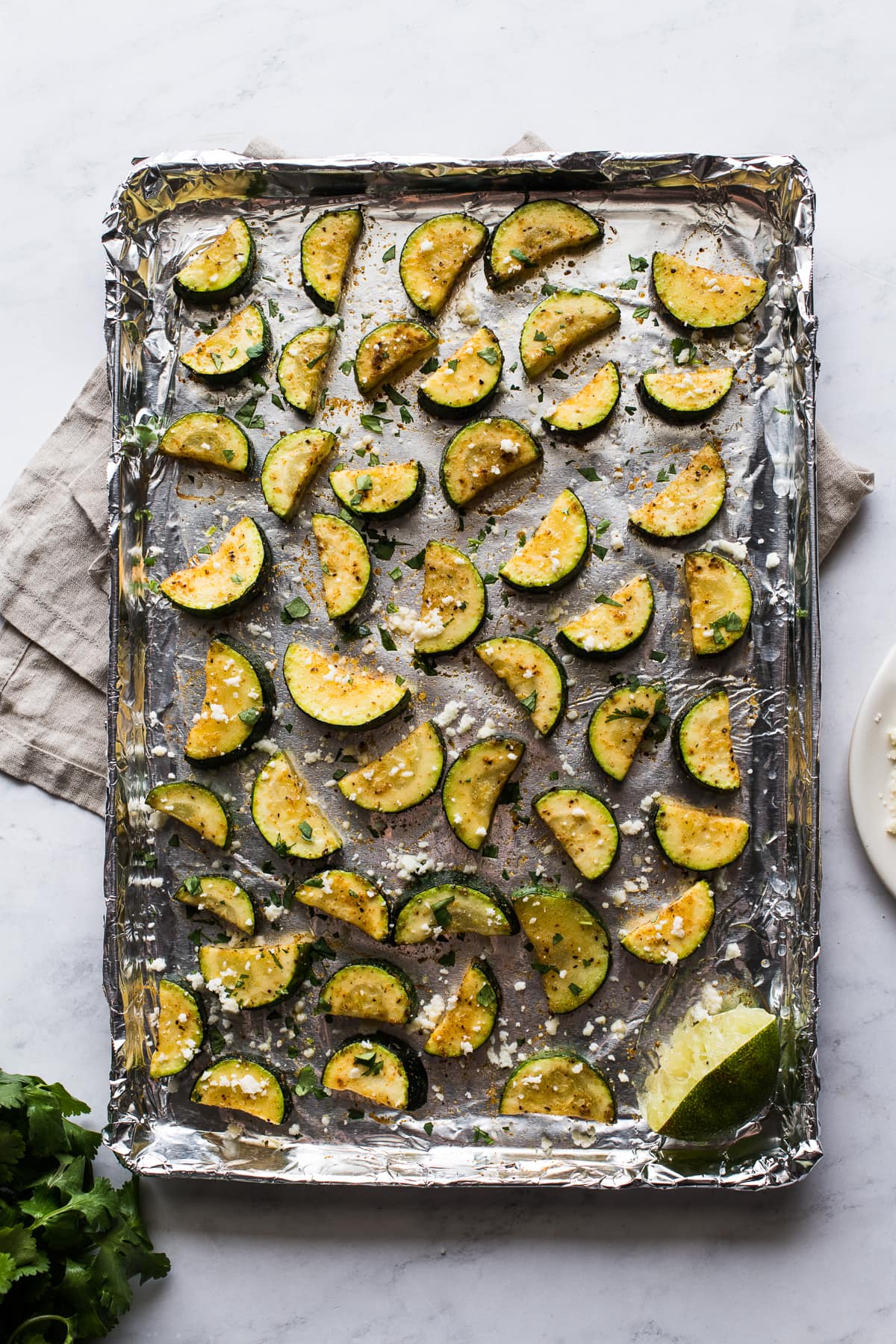Roasted Mexican Zucchini on a sheet pan.