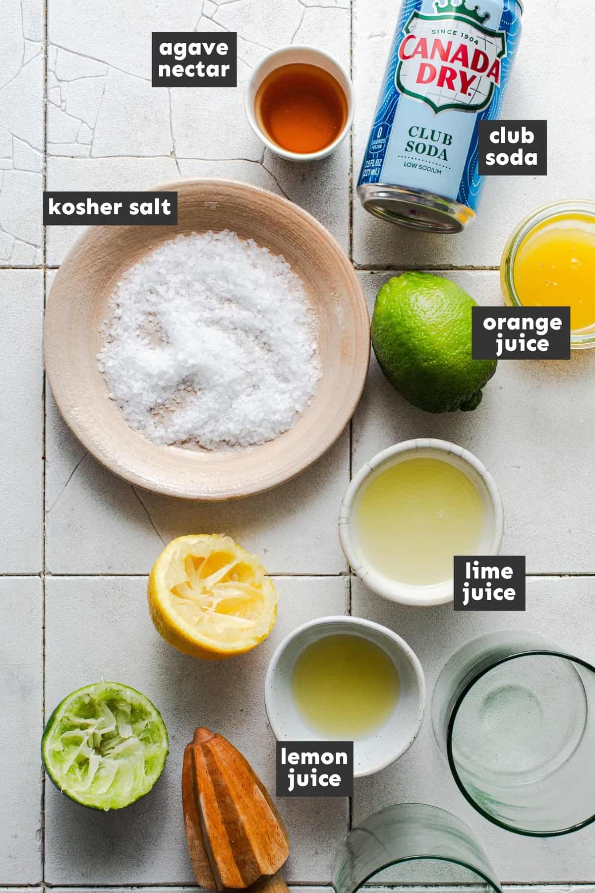 Ingredients for a margarita mocktail on a table.