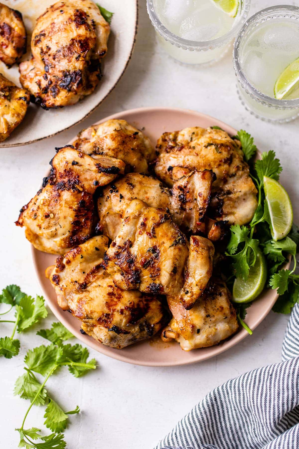 Lime chicken marinated thighs on a plate ready to eat.