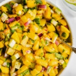 Mango salsa served in a bowl.