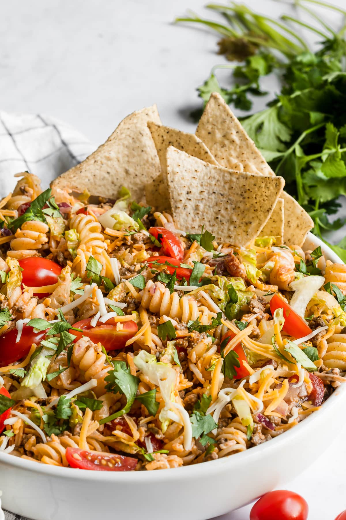 Taco pasta salad served with tortilla chips