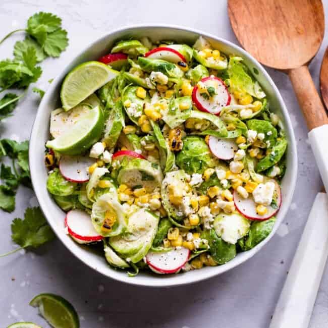 Mexican Brussels Sprout Salad in a bowl ready to serve.