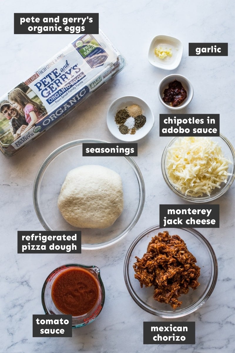 Ingredients in Mexican Breakfast Pizza on a table.