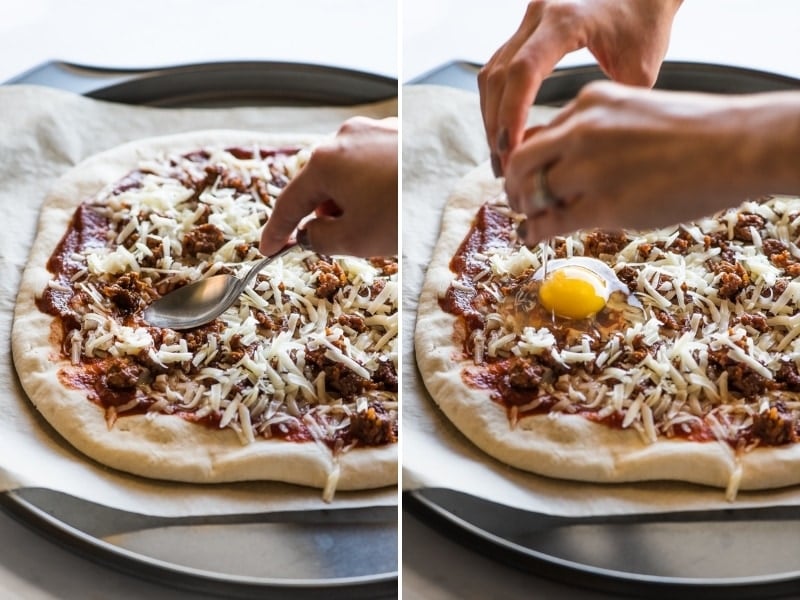 Cracking an egg on breakfast pizza.