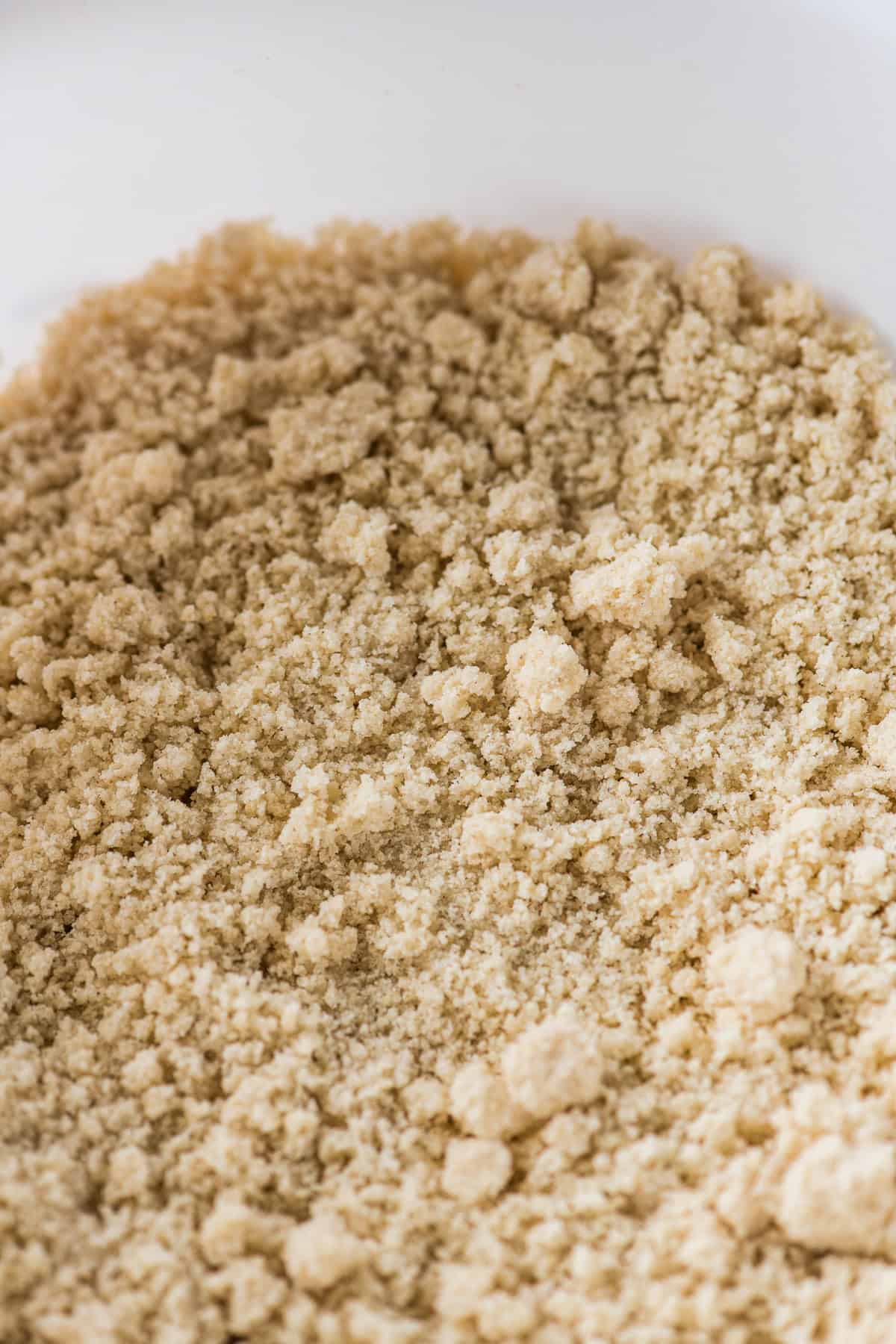 Masa harina mixed with oil until it looks like wet sand.