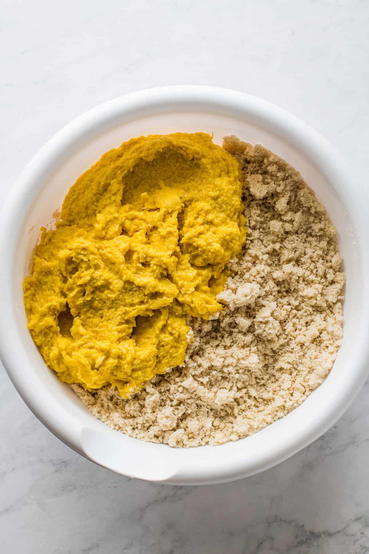 Blended corn and masa in a bowl before mixing.