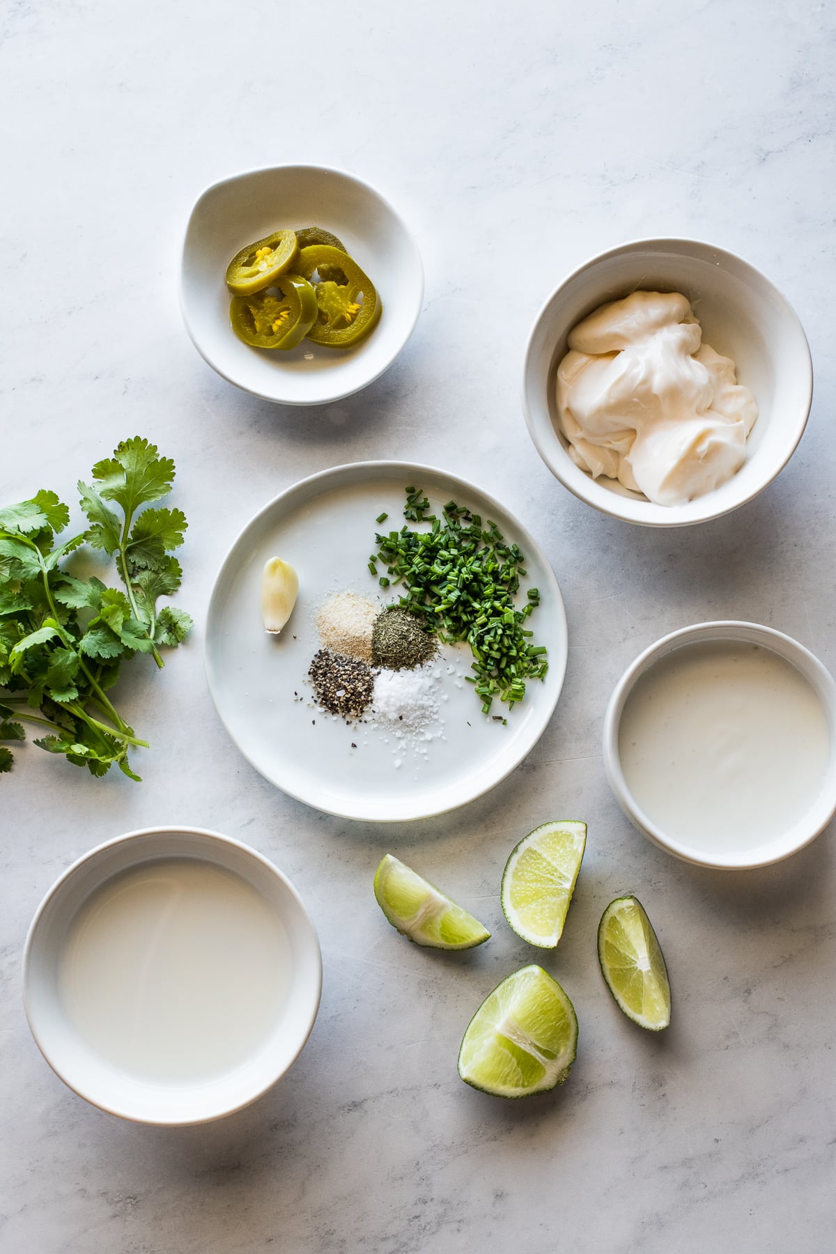 Jalapeno ranch ingredients in small individual bowls.