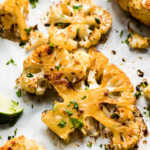 This Spicy Roasted Cauliflower recipe features cauliflower roasted to crispy perfection in an easy chipotle sauce making it a healthy and delicious low carb side dish!