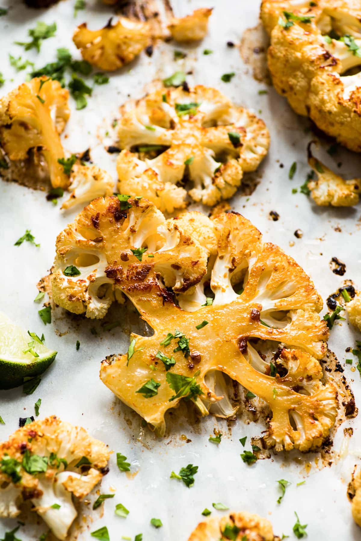 Spicy roasted cauliflower topped with cilantro and lime juice.
