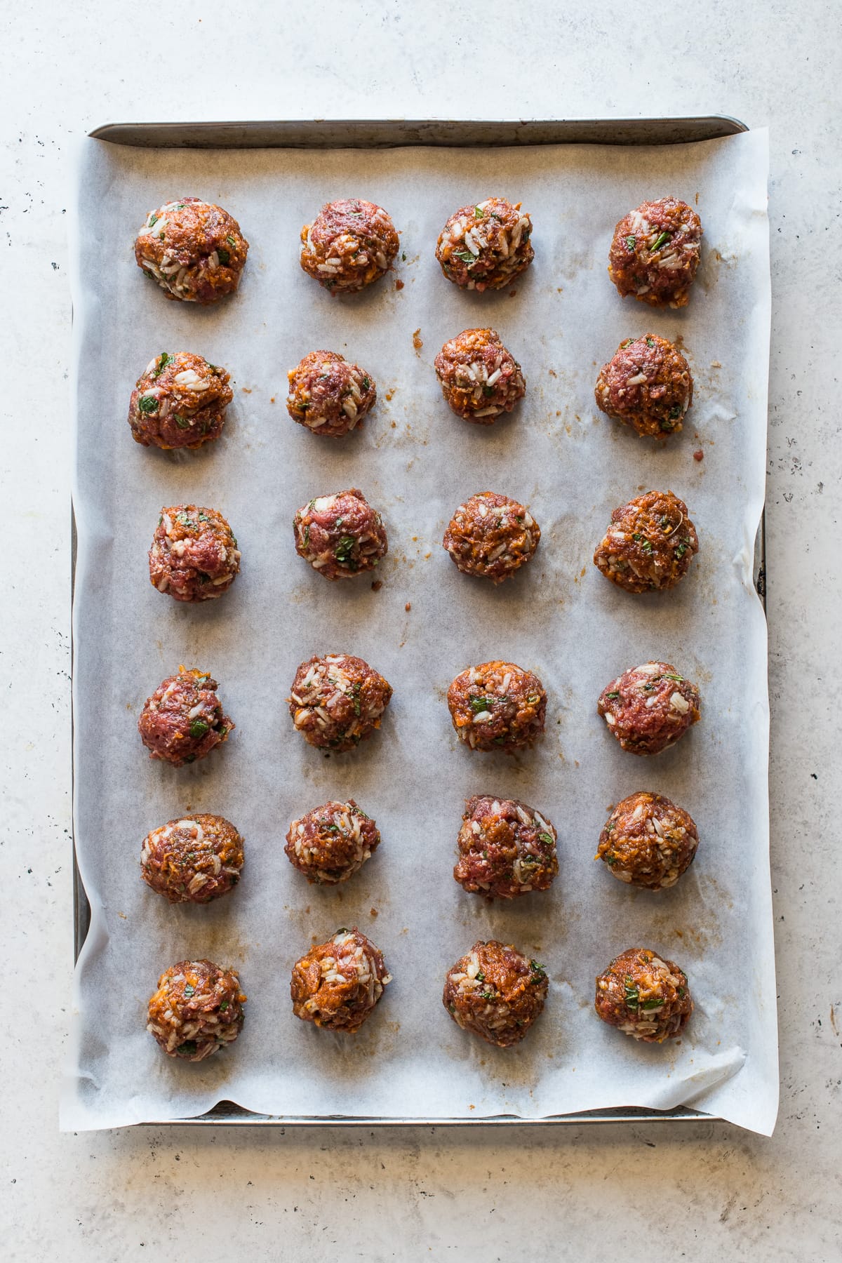 Meatballs on a baking sheet for albondigas soup