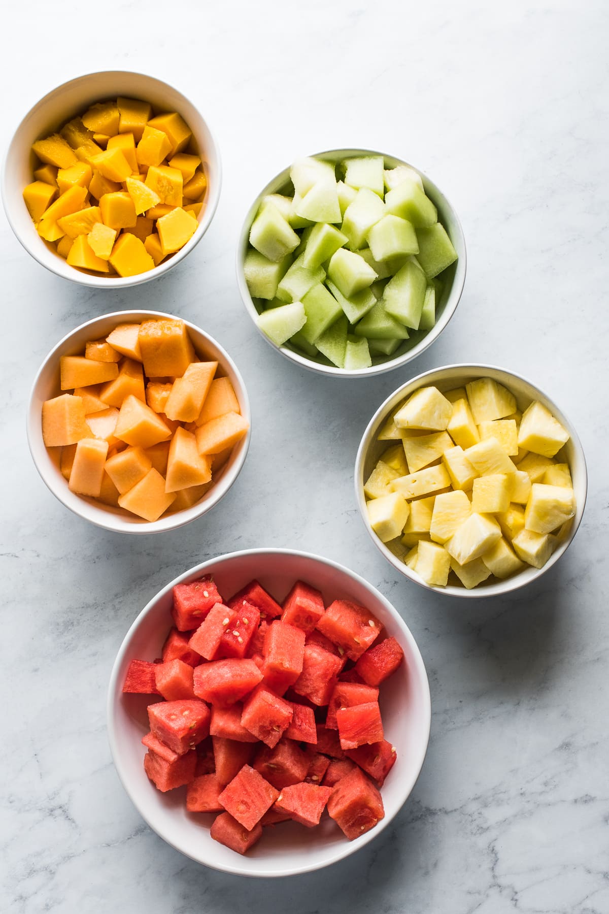 Diced watermelon, mango, cantaloupe, pineapple, and honeydew.