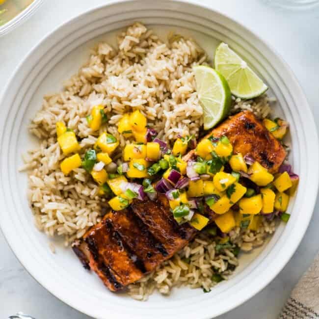 Chili Garlic Grilled Salmon topped with mango salsa.